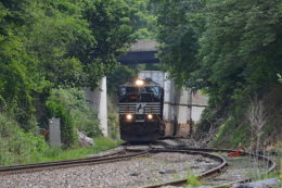 NS train 227 is led by SD70M #2597 as it crests Linden Hill in Virginia on 7/13/2017.