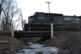 NS train 203 is led by NS (Ex-Conrail) D8-40CW #845 east over a frozen stream in Linden, Va on 1/6/2018.