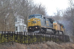 CSX C40-8W #7753 leads NS train 211 east through Markham, Va on 3/27/2018.