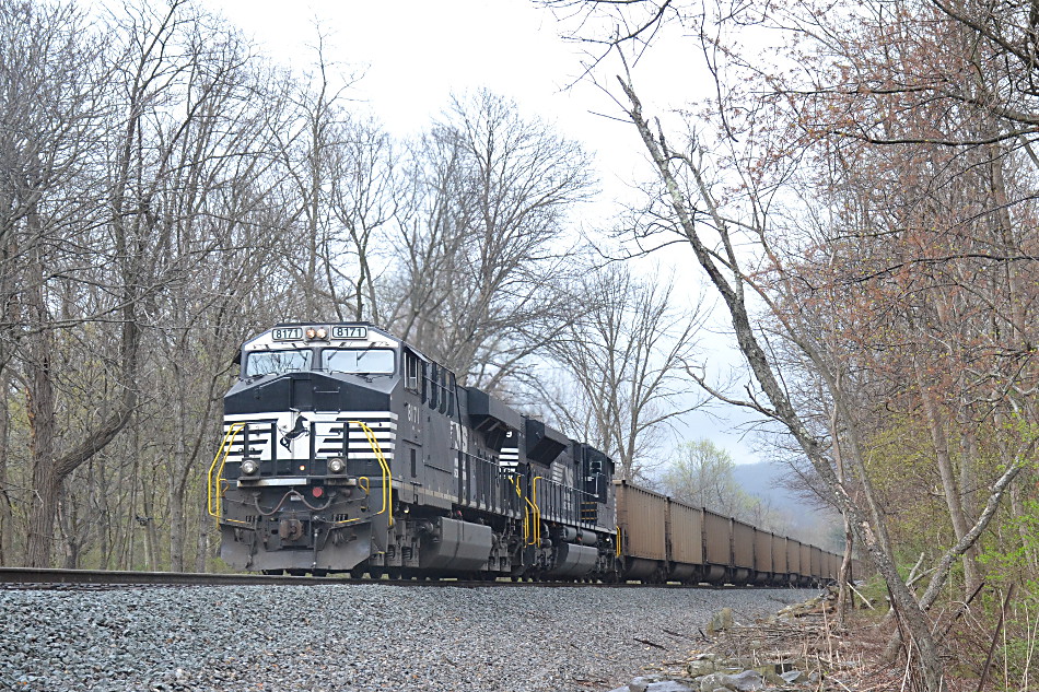 DPUs NS SD70ACe #1179 and ES-44AC #8171 push on the rear of NS train 740 (loaded coal train) in Linden, VA on 4/12/2019. 