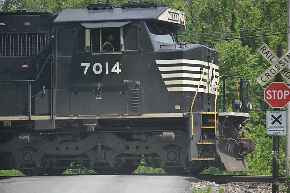 Led by Norfolk Southern SD60E #7014, NS train 13R passes the CCC Road crossing in Linden, Virginia on 5/23/2019.