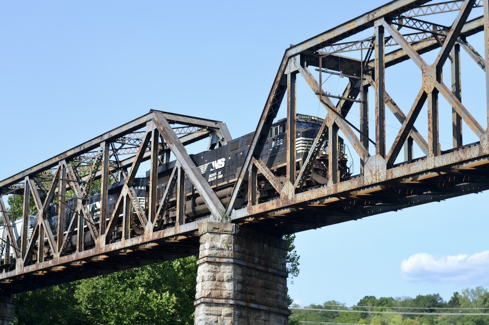 Norfolk Southern freight train crossing over a bridge