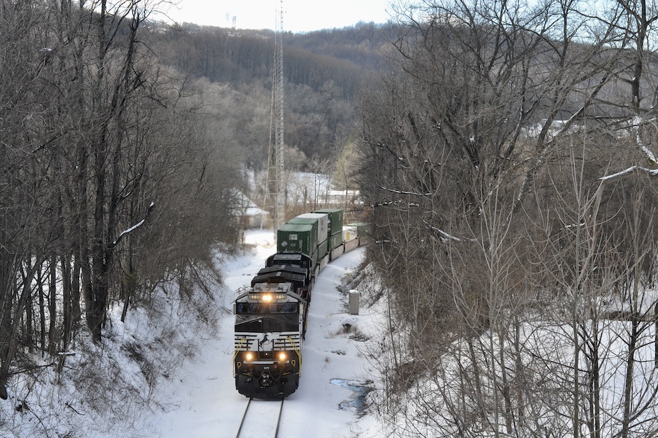 A view of a Norfolk Southern intermodal train from an overpass