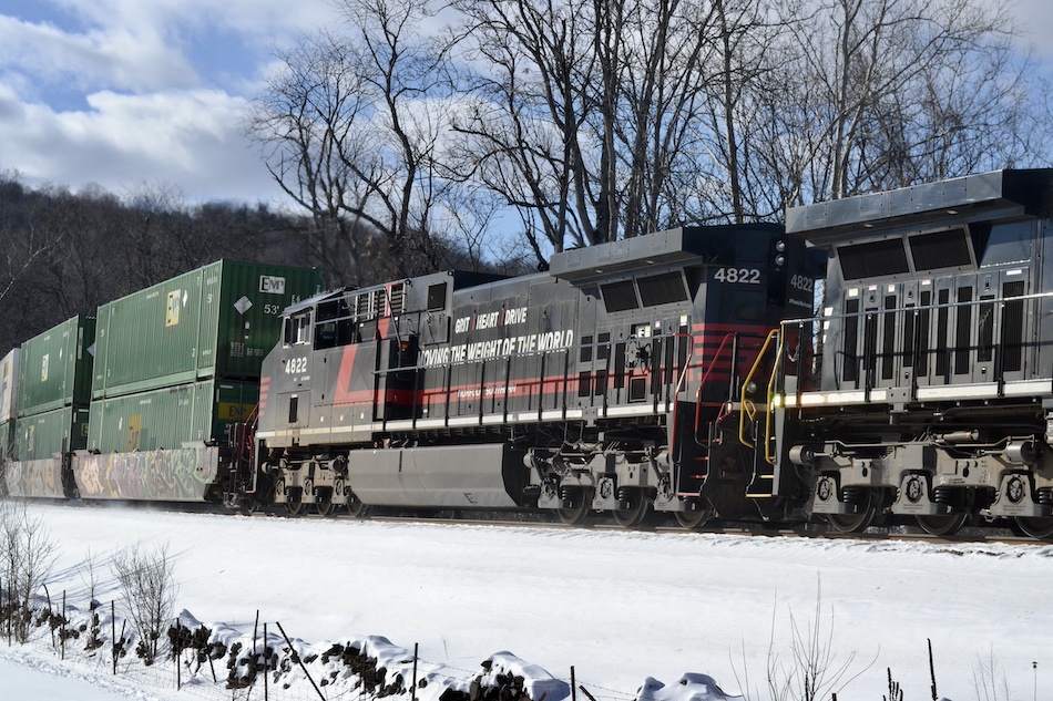 A specially painted black and red Norfolk Southern locomotive dedicated to railroaders